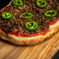Bisonte Pinsa flat-bread pizza with ground bison and jalapeños