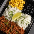 Healthy birria bowl meal prep with beef and rice – MegaFit Meals