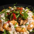 Shrimp Alfredo with grilled shrimp and creamy pasta high-protein meal by MegaFit Meals