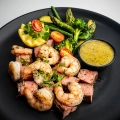 Surf and Turf meal featuring steak and seafood