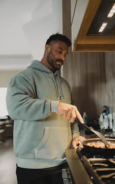 Athlete Chris Bumstead Heating MegaFit Meals